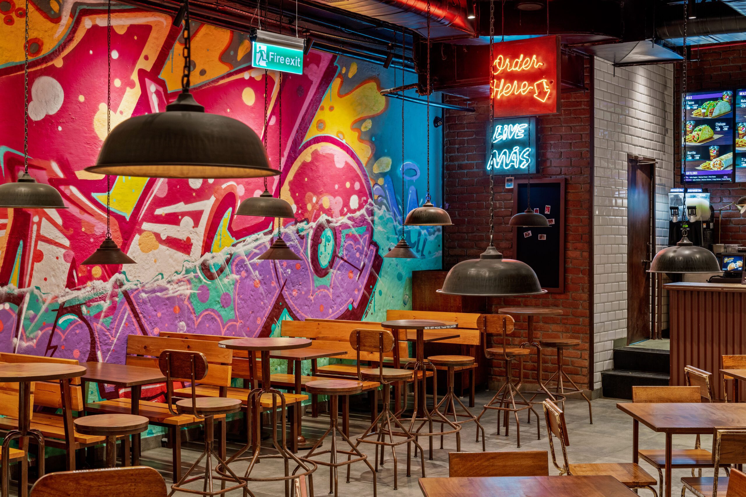 Taco Bell dine-in area with warm lighting